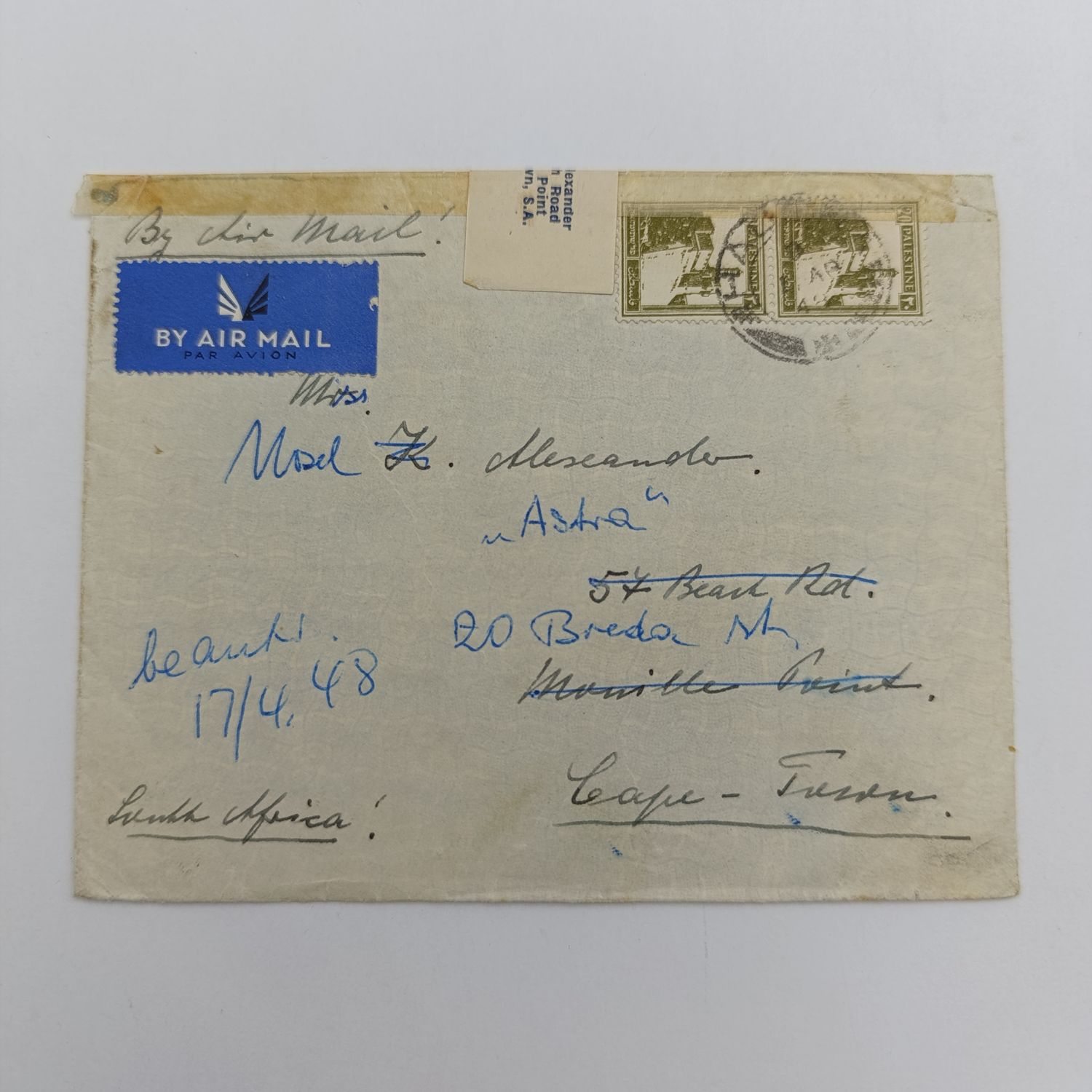 Palestine Air Mail cover to Cape Town with interesting re-sealed label on top - 2 Palestine stamps cancelled 1948 - with address changed