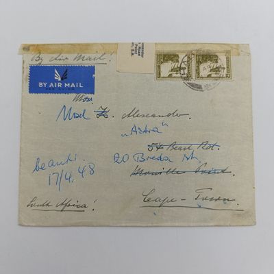Palestine Air Mail cover to Cape Town with interesting re-sealed label on top - 2 Palestine stamps cancelled 1948 - with address changed