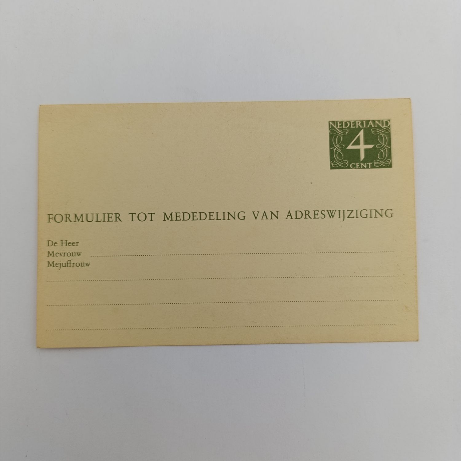 Netherlands vintage change of address postcard with pre printed 4 cent stamp