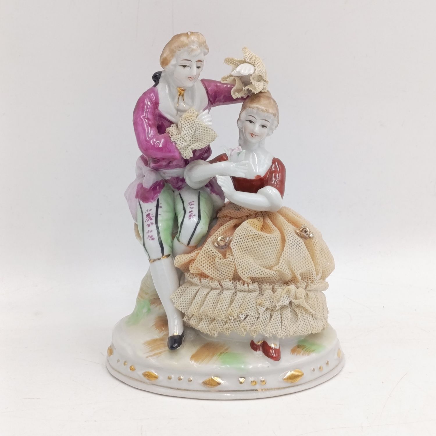 Vintage Louis XV style porcelain figurine