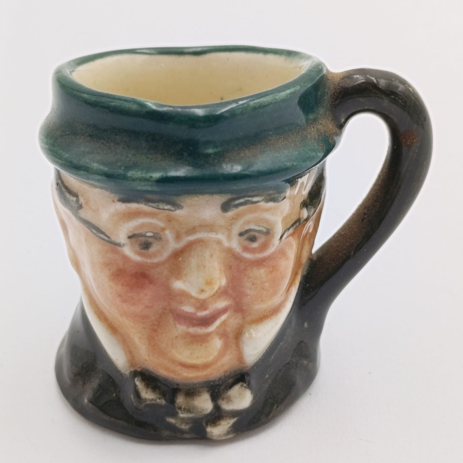 Miniature Royal Doulton toby jug
