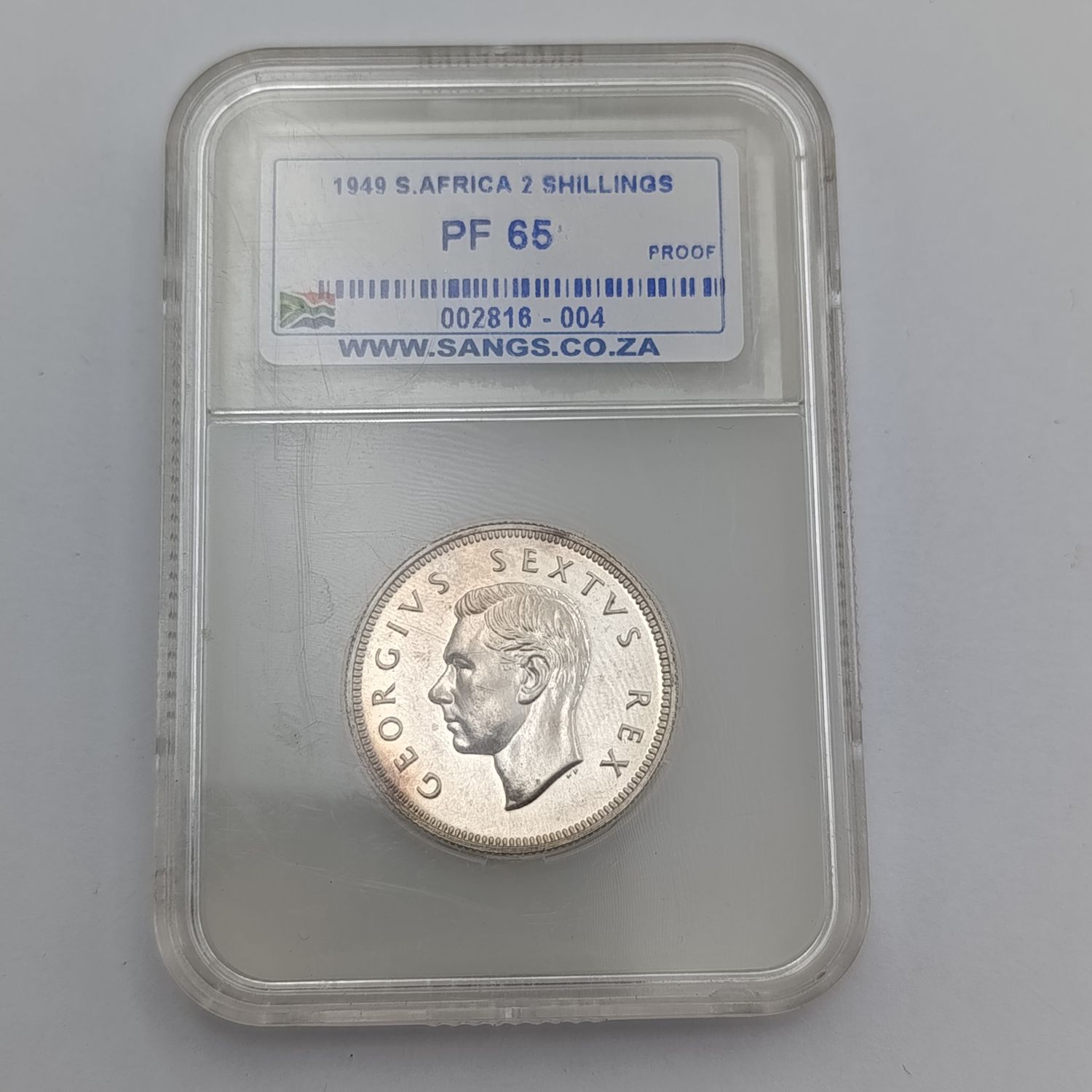 1932 South Africa Shilling graded MS63 by NGC