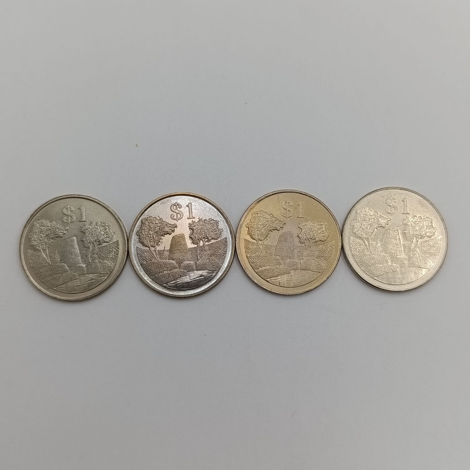 Zimbabwe set of 4 x $ coins 1980, 1993, 1997 &amp; 2001