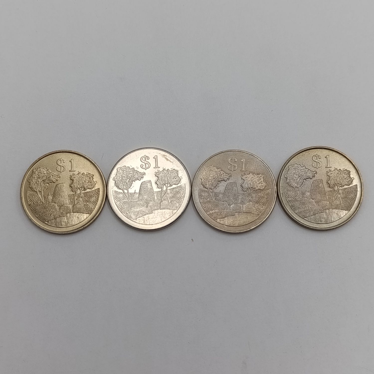 Zimbabwe set of 4 $ coins 1980, 1993, 1997 &amp; 2001