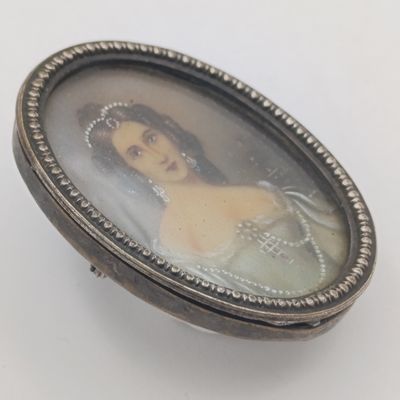 Antique handprinted portrait of lady in brooch late 19th century French school