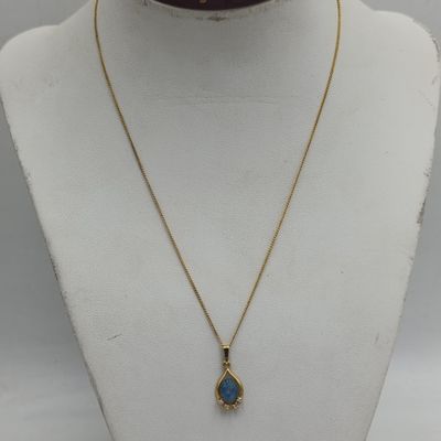 Thin 9kt gold necklace with opal and diamonds pendant - weighs 1.9g