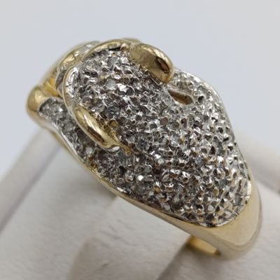 9kt gold predator with a multitude of small diamonds - weight 5.8g