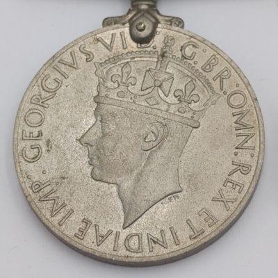 Set of 6 medals issued to Sygnalman FG Nethercott - 5 unnamed WW2 medals plus George 6 Efficient Service medal