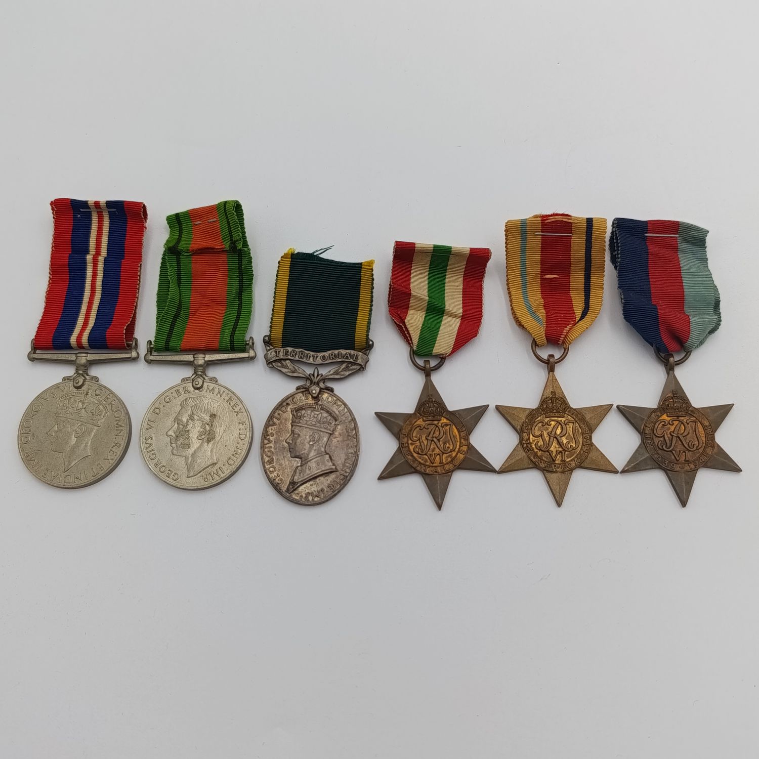 Set of 6 medals issued to Sygnalman FG Nethercott - 5 unnamed WW2 medals plus George 6 Efficient Service medal