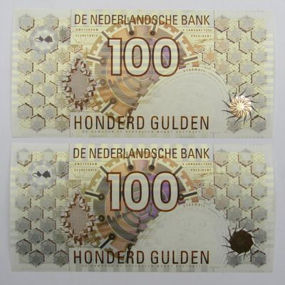 Pair of Netherlands 100 Gulden Uncirculated (UNC) banknotes. Light brown, and Dark brown bar codes