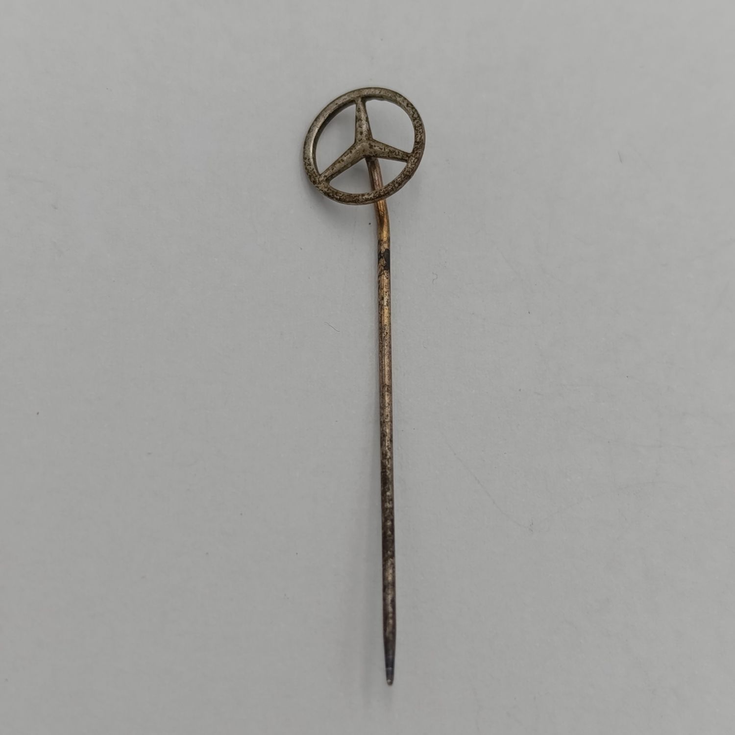 Vintage silver Mercedes-Benz stick pin badge