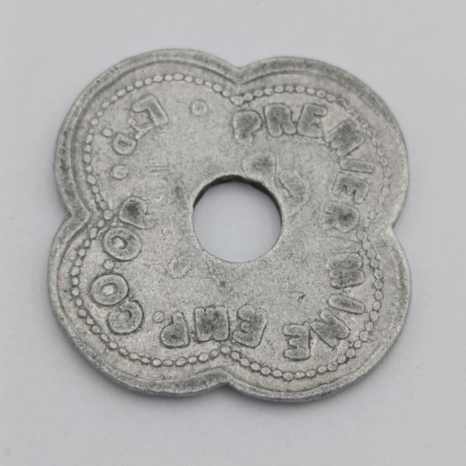 20 Shilling Premier Mine token with O punched out to make 2shilling