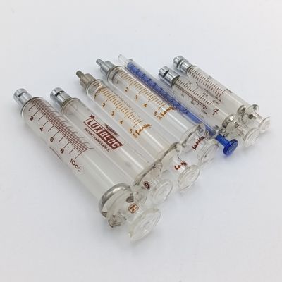 Lot of 7 vintage glass syringes