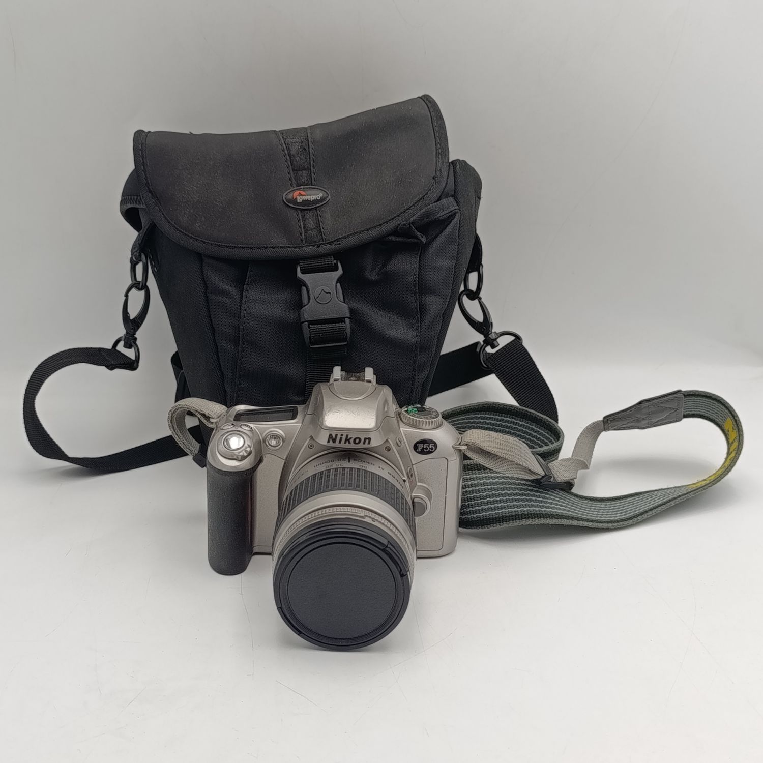 Nikon F22 camera with 28-80mm 1:3.3-56 lens in camera bag