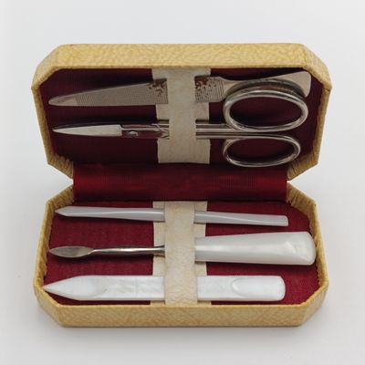 Vintage nail care kit in radio shaped case