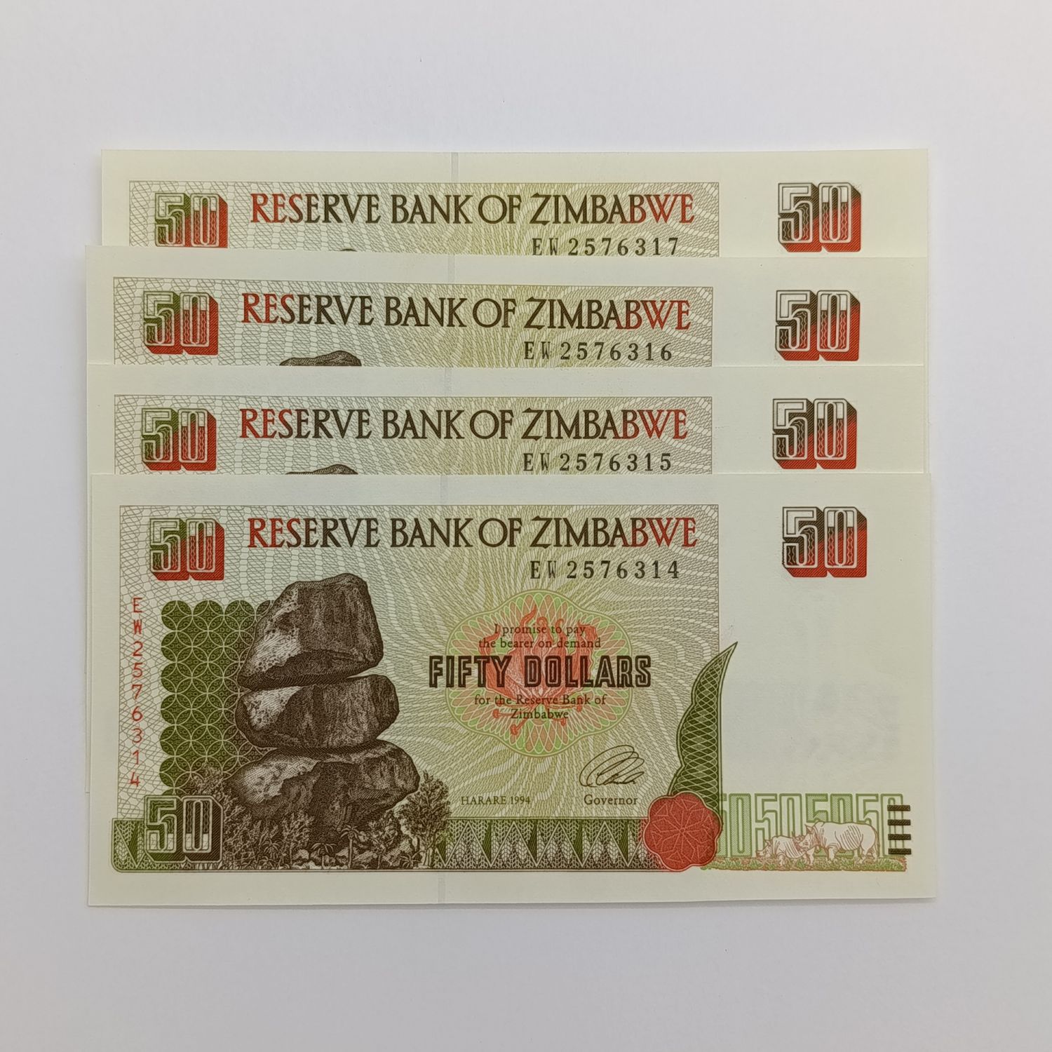 Zimbabwe $50 Harare 1994 lot of 4 uncirculated notes with consecutive numbers