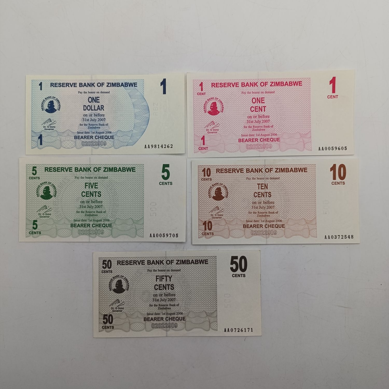 Zimbabwe 1-8-2006 set of lowest denomination bearer cheques 1 cent to 1 dollar uncirculated - hand to get AA series