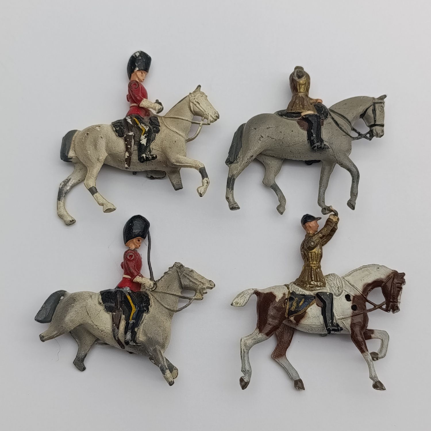 Lot of 4 vintage Britains Ltd cavalry lead soldiers - damaged