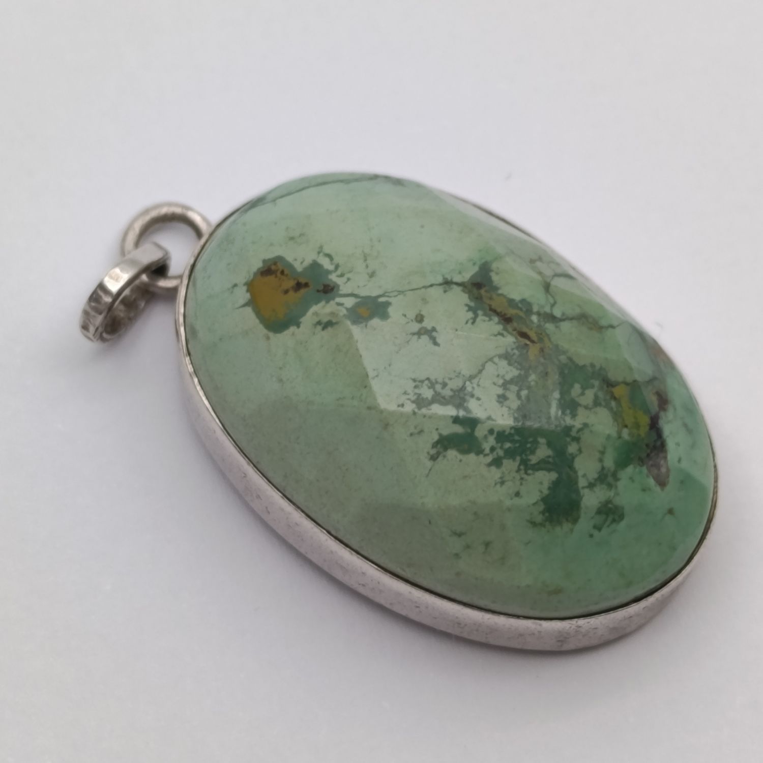Variscite faceted cabochon 11g with silver surround - stone about 25 carat