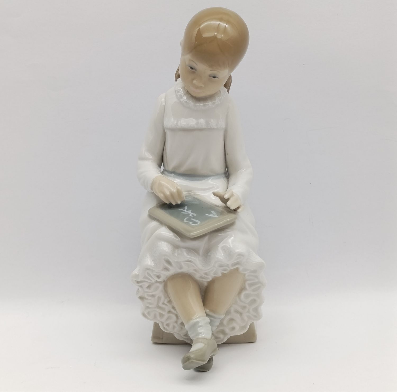 Vintage Rosal by Lladro girl writing figurine - these were some of the earlier figurines made by Lladro brothers under the Rosal name