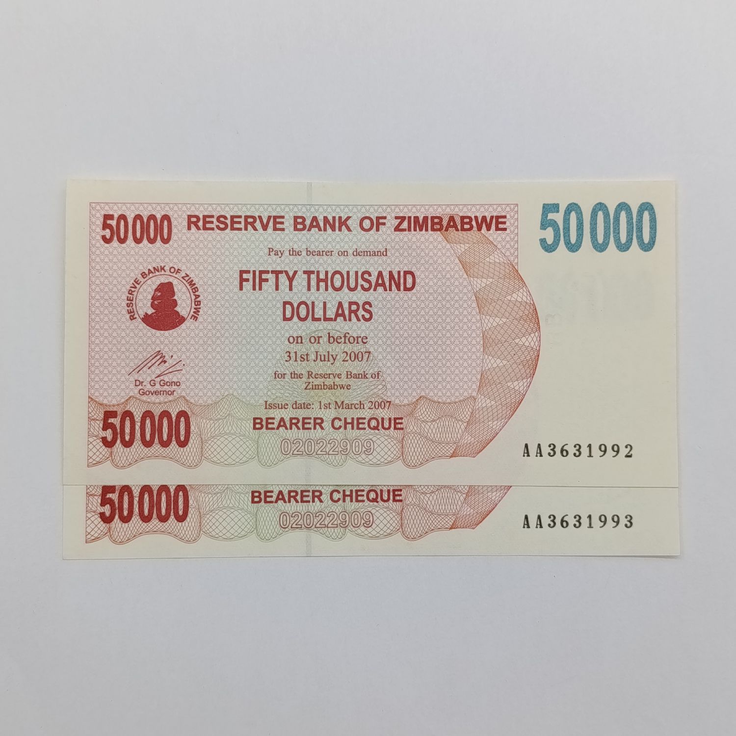 Zimbabwe $50 000 bearer cheque issued 1 March 2007 consecutive numbered uncirculated pair-AA numbers