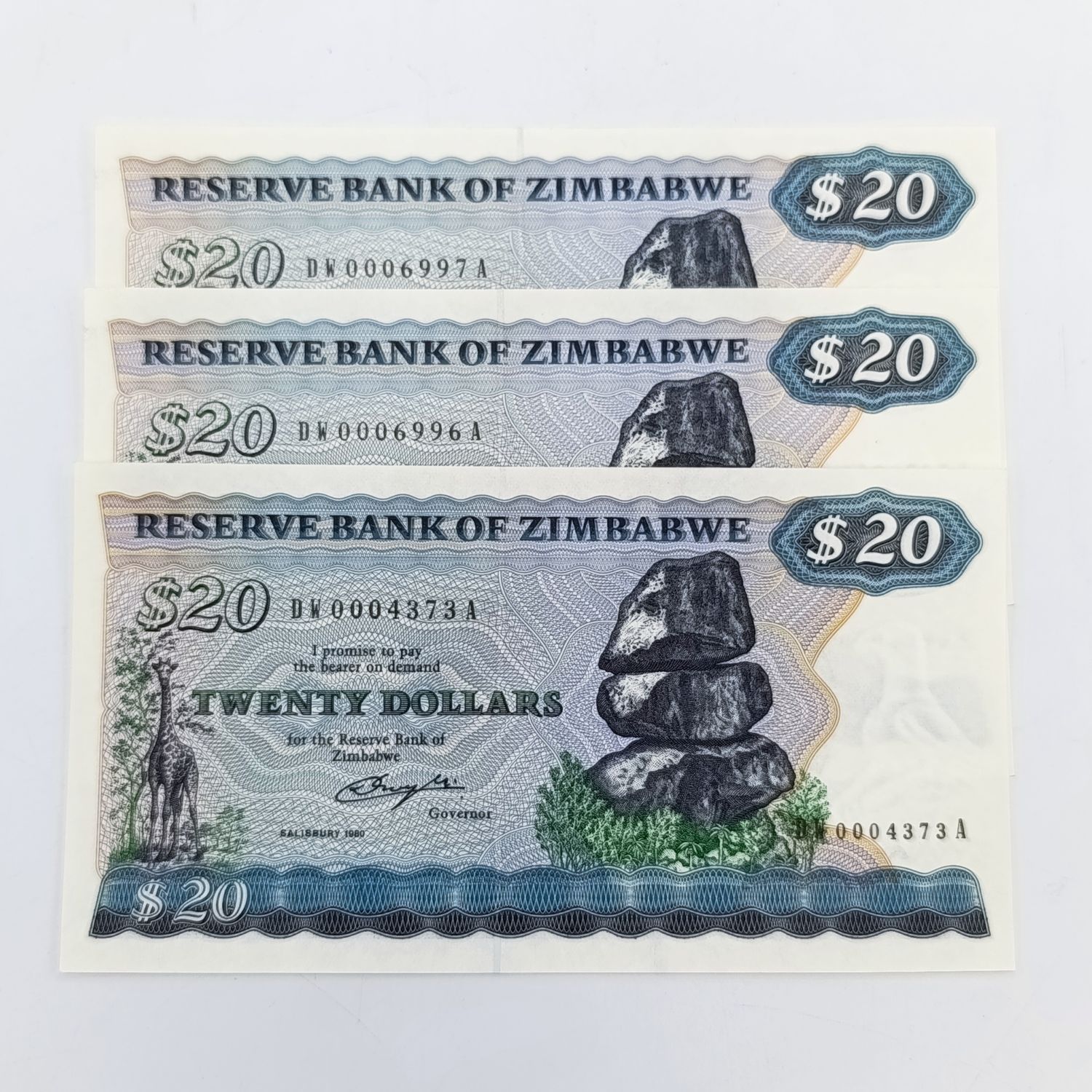 Lot of 3 Zimbabwe $20 replacement notes uncirculated - 2 with consecutive numbers Salisbury 1980 - with wrapper