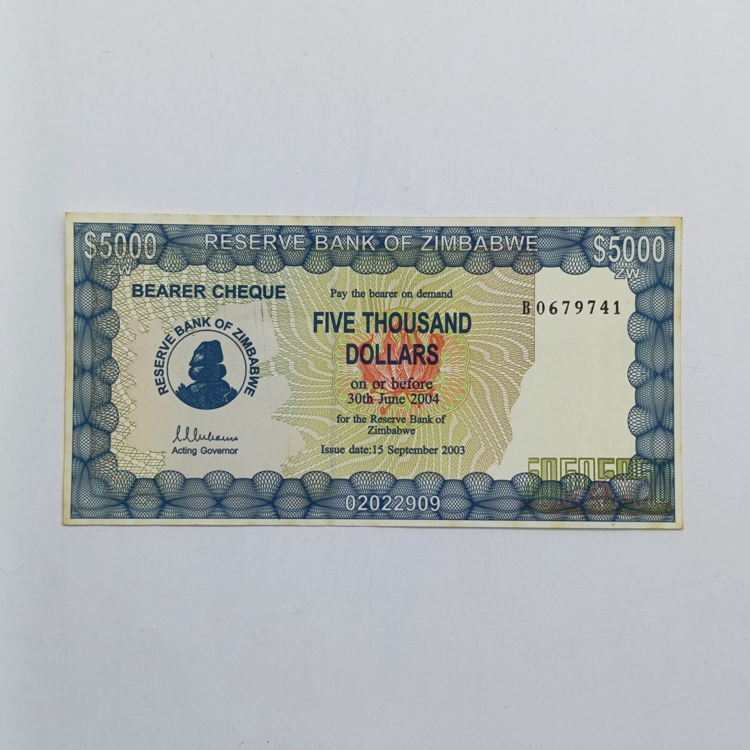 Zimbabwe $5000 Bearer cheque issued 15 Sept 2003 uncirculated with paper clip dent B number