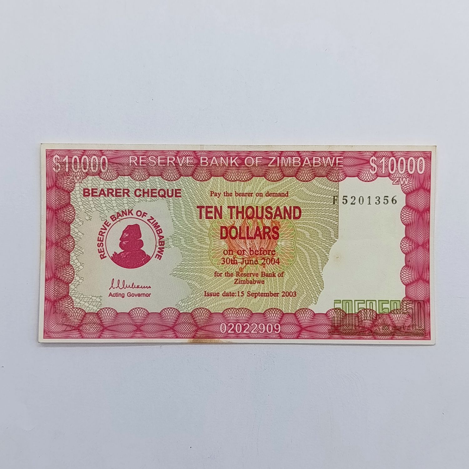 Zimbabwe $10 000 issued 15 September 2003 Bearer cheque - some discoloring but unused