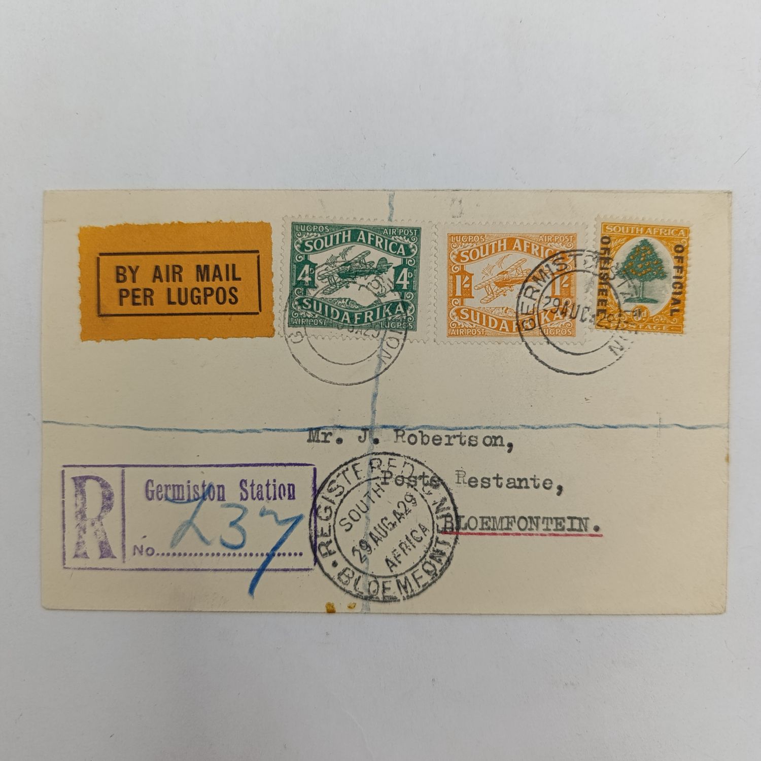 Registered airmail cover Germiston Station to Bloemfontein, South Africa with Orange airmail label and 3x South Africa stamps (one official) cancelled 29 August 1929
