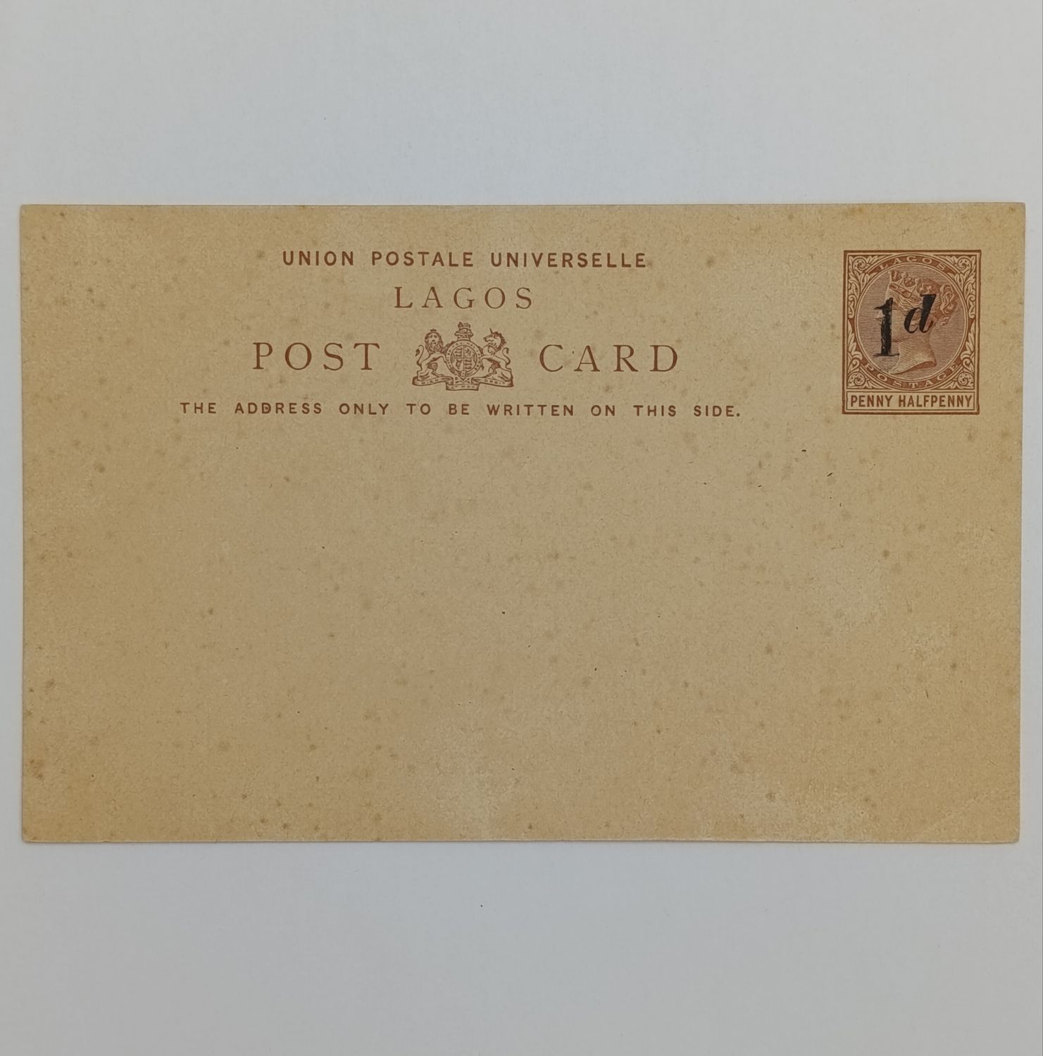 Unused Lagos postcard with pre printed postage halfpenny overprinted 1d