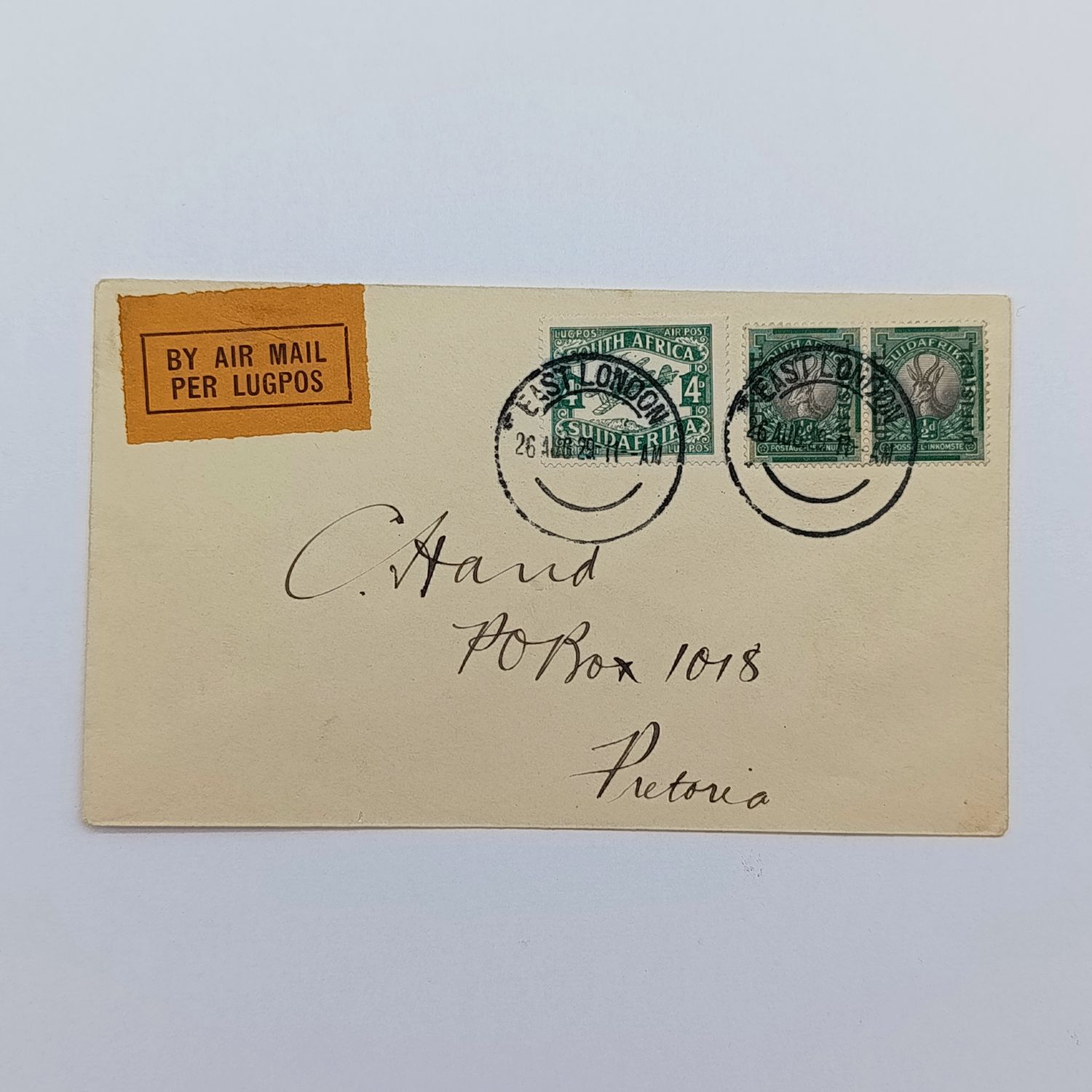 Air mail cover East London to Pretoria cancelled 26 Aug 1929 over a pair of official stamps