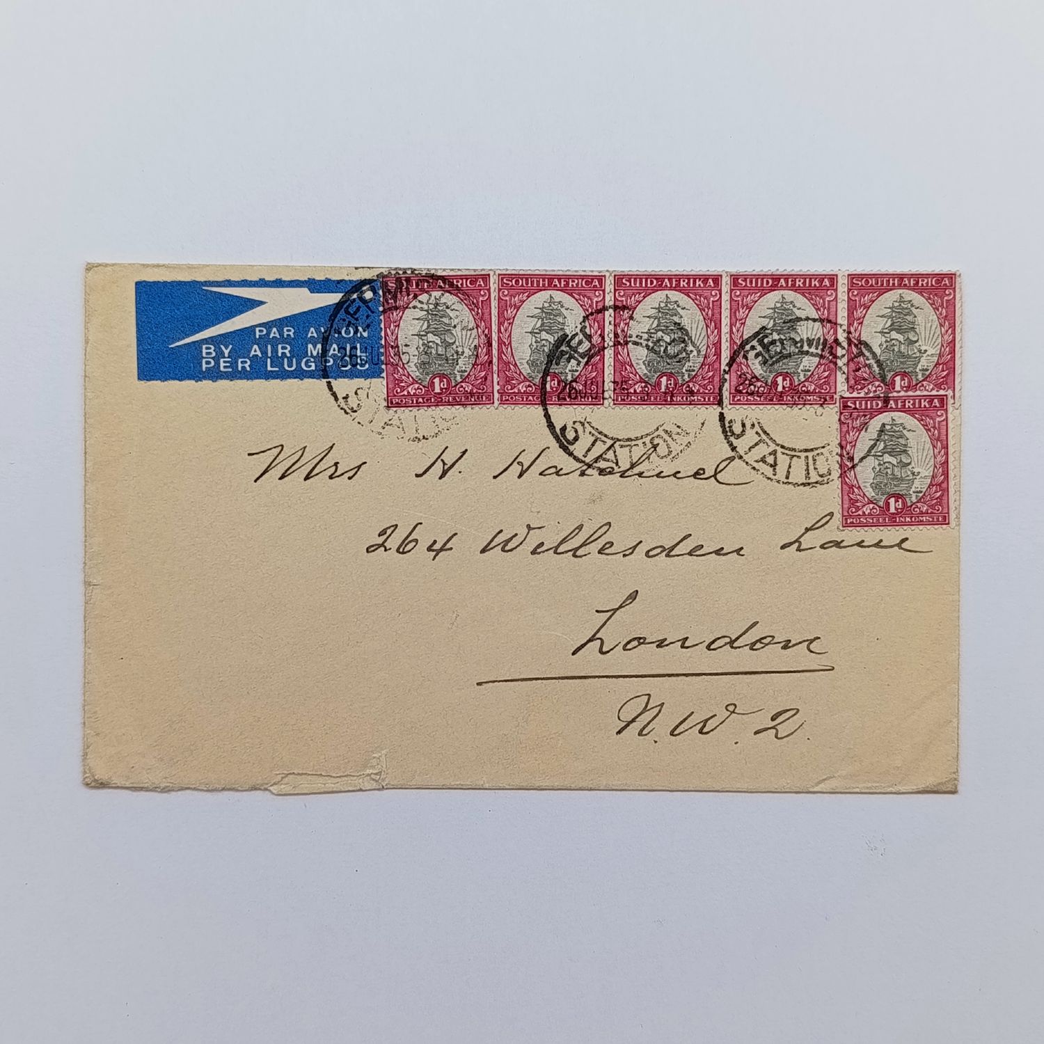 Airmail Cover Germiston Station South Africa to London with 6 x South Africa 1d stamps cancelled 26 Jul 1935 and blue airmail label