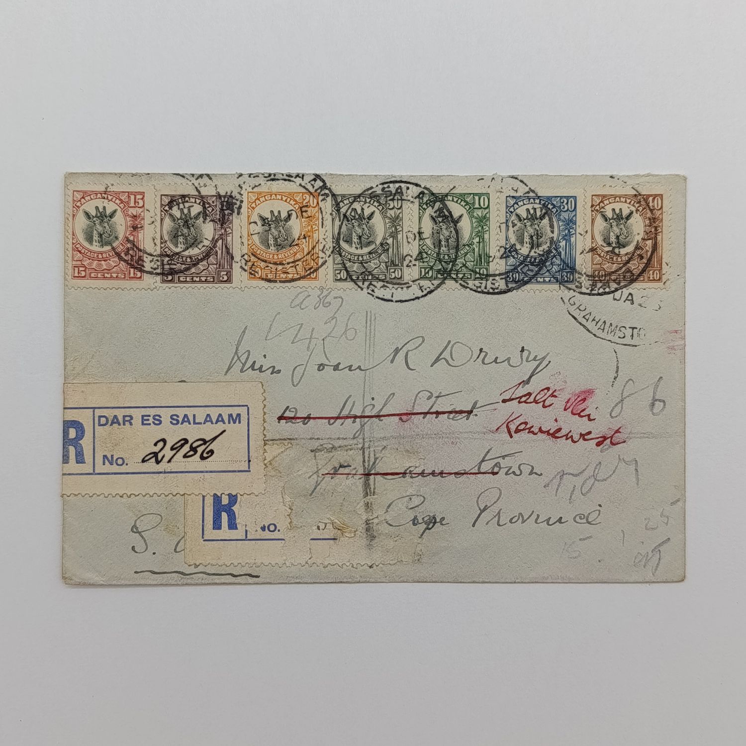 Postal History cover registered from Dar es Salaam, Tanzania to Grahamstown,South Africa with 7 colorful Tanganyika stamps - Redirected from Grahamstown to Kowie West and backstamped Grahamstown