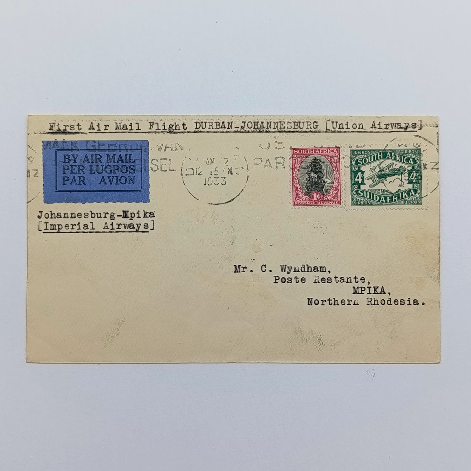 First Airmail flight cover Durban South Africa to Mpika Northern Rhodesia via Johannesburg 2 January 1933 wih SACC 40 and SACC 43 - unclear cancellation on front with blue Air mail label