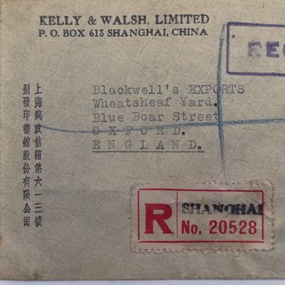 Registered cover from Shanghai China to Oxford, England with 4 Chinese stamps cancelled 26-4-1948 with Registered cancel + Shanghai registered label - also Kelly & Walsh Ltd rubber stamp