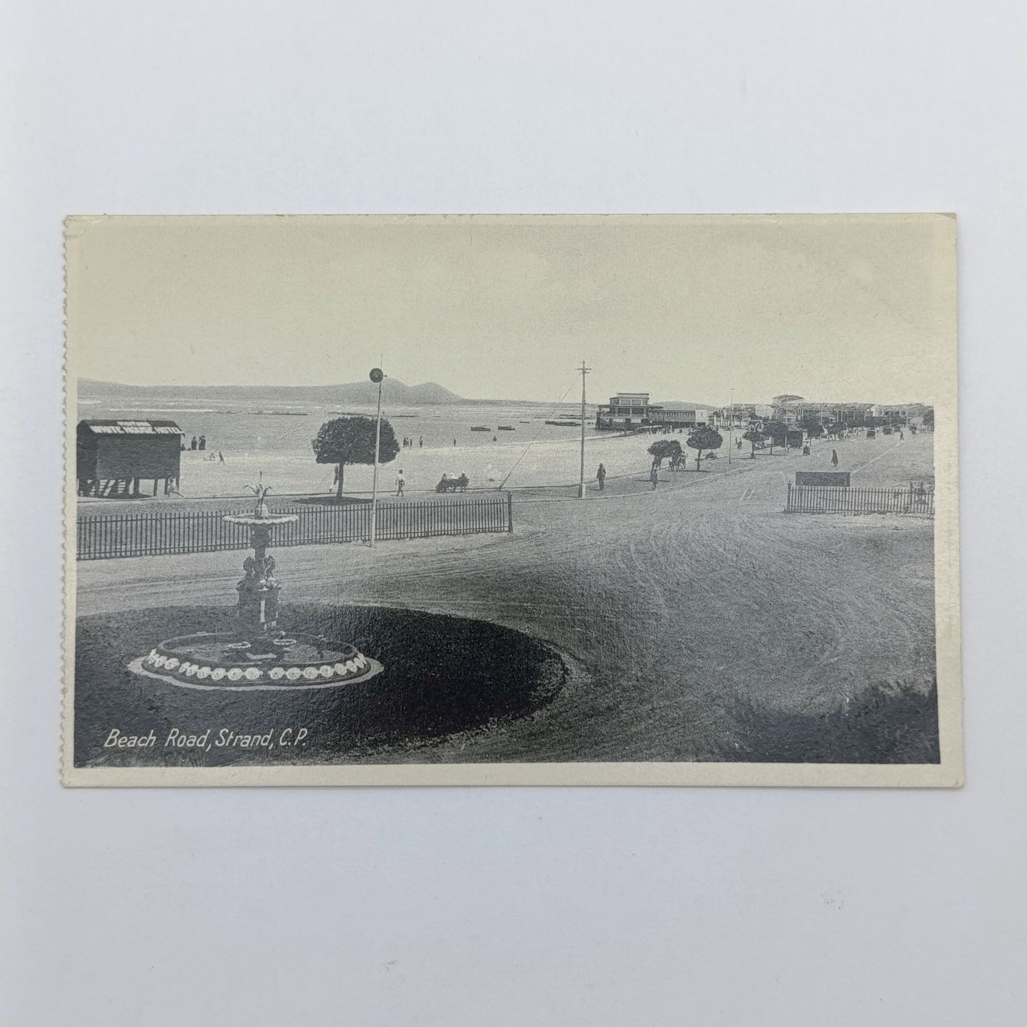 Postcard unused with picture of Beach Rd Strand - In front of white House Hotel
