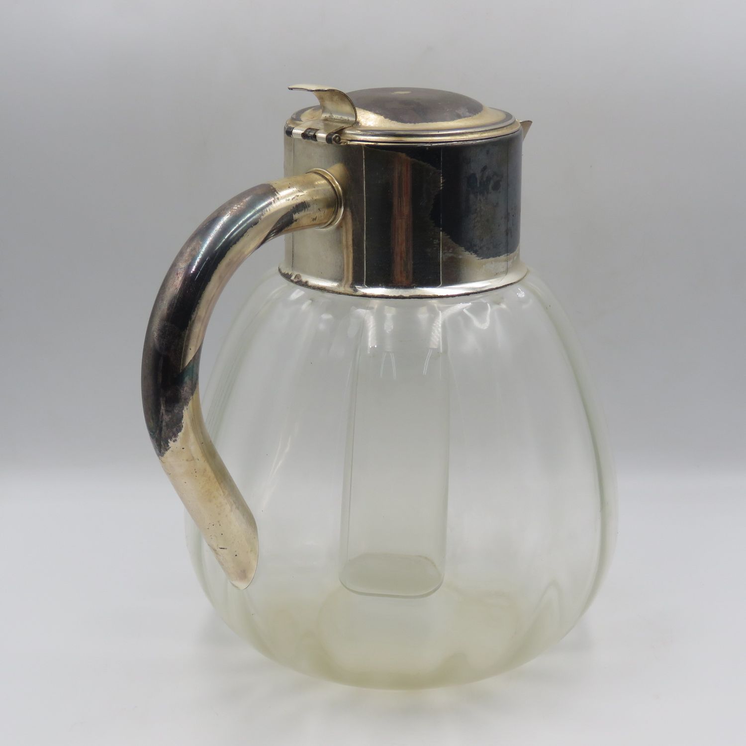Vintage glass pitcher with silverplated top presented to SADF Chief of Staff Lieutenant - General J. R. Dutton who also served as a tank commander in the Korean War