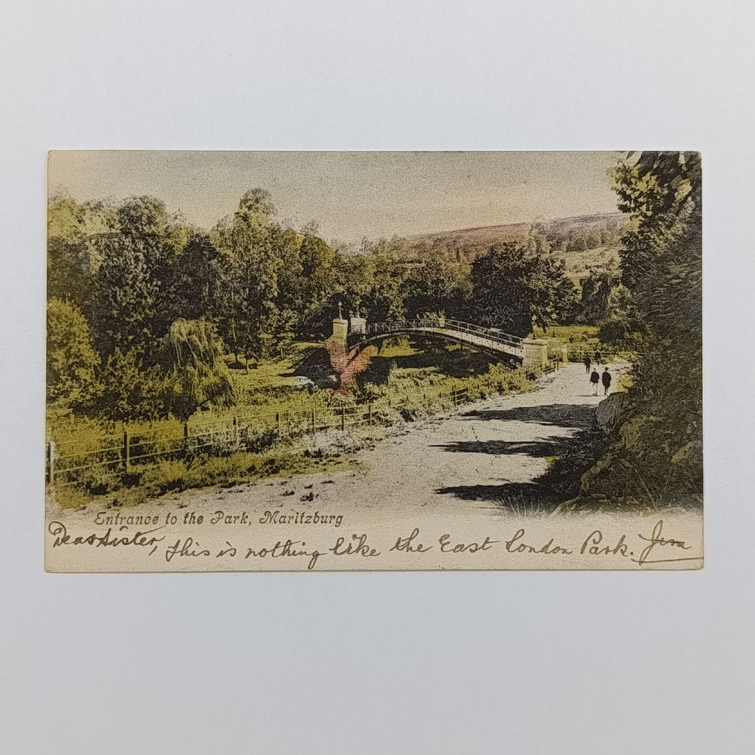 Postcard with bridge in Maritzburg Park picture from Pietermaritzburg South Africa to East London with East London Jetty postmark 27 February 1906 and upside down  1 penny Natal stamp