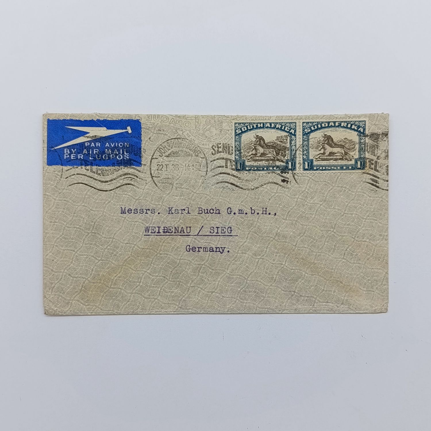 Airmail cover First Flight Johannesburg to SIEG Germany with SACC 49 pair used and blue airmail label 22 Jan 1938 cancel &amp;backstamped Taeuber &amp; Covssen (pty) Ltd