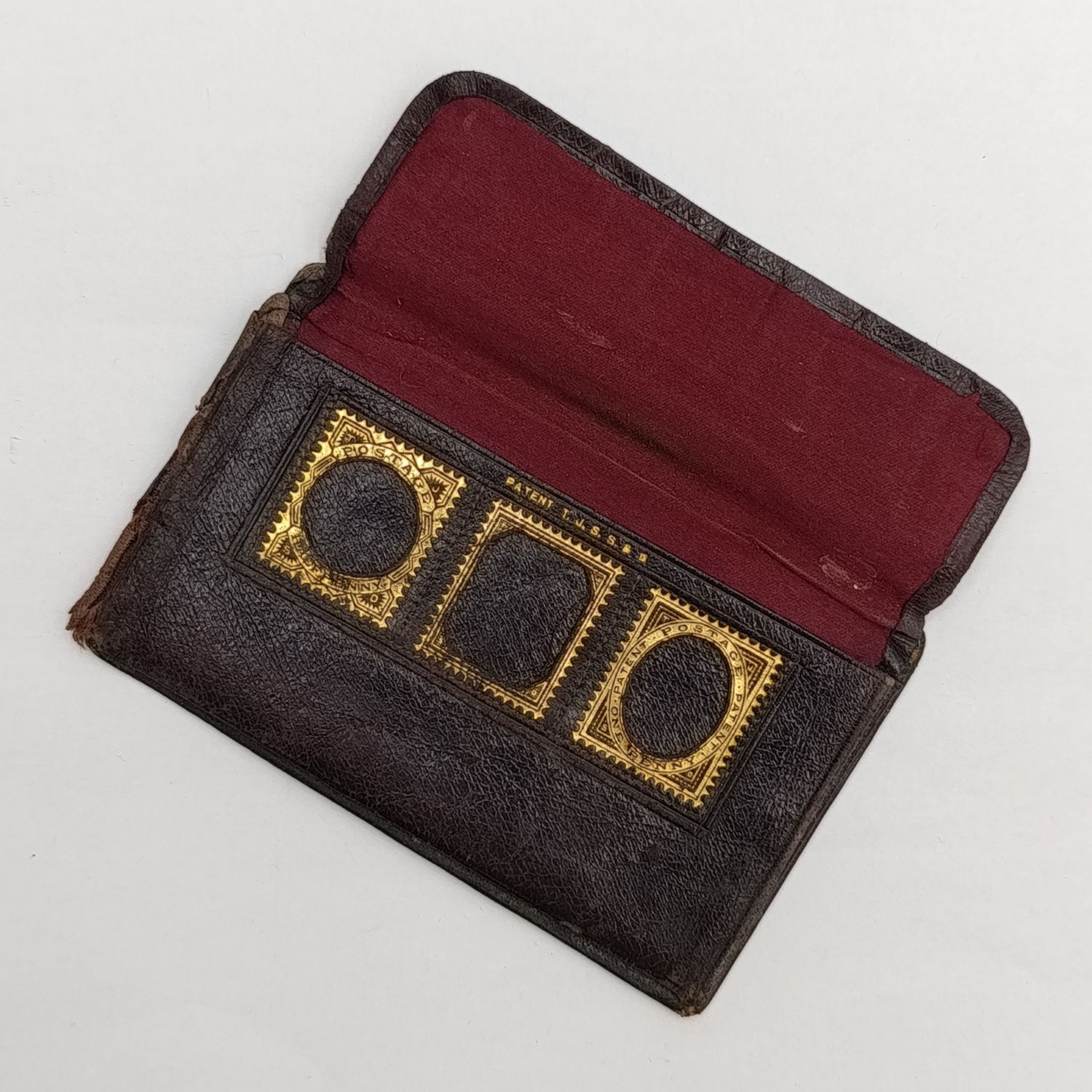 Antique leather stamp wallet