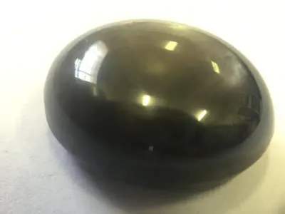 Natural star Sapphire of 15.594 carat - Oval cabachan greyish brown with Gemlab and GISA certificate