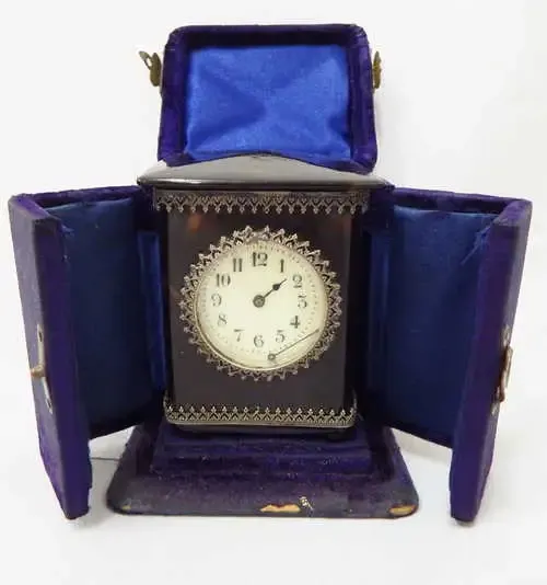 Antique French tortoise shell travelling clock in case