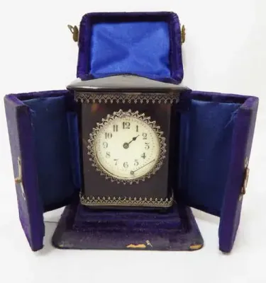 Antique French tortoise shell travelling clock in case