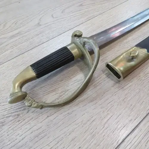 Antique sword with brass hilt and ebony fluted handle - no markings, possibly French