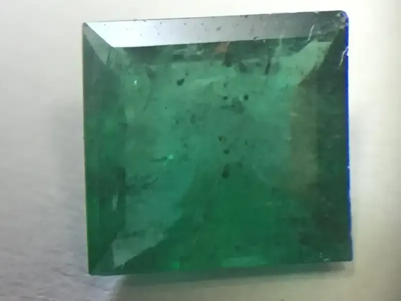 Natural Emerald of 0.737 of square step cut slight bluish green with Gemlab certificate
