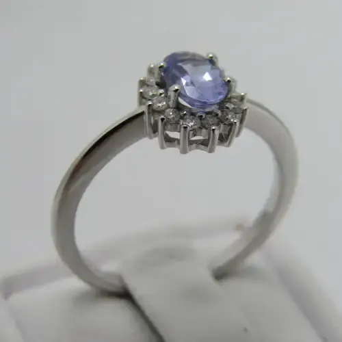 9kt white gold ring with 0.48ct tanzanite and diamonds of 0.11ct in total - weighs 2.4g - size M/6