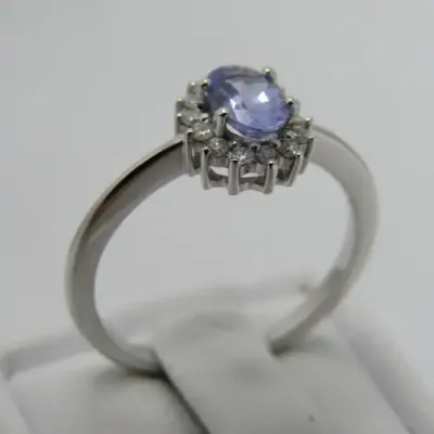 9kt white gold ring with 0.48ct tanzanite and diamonds of 0.11ct in total - weighs 2.4g - size M/6