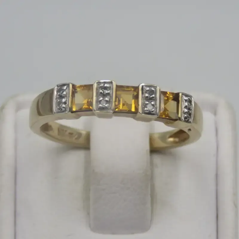 9kt Gold ring with citrines and small diamonds - weighs 2.0g - size N/7