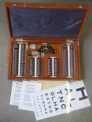 Vintage optometrist lens set refraction with more than 220 lenses in box including trial frame