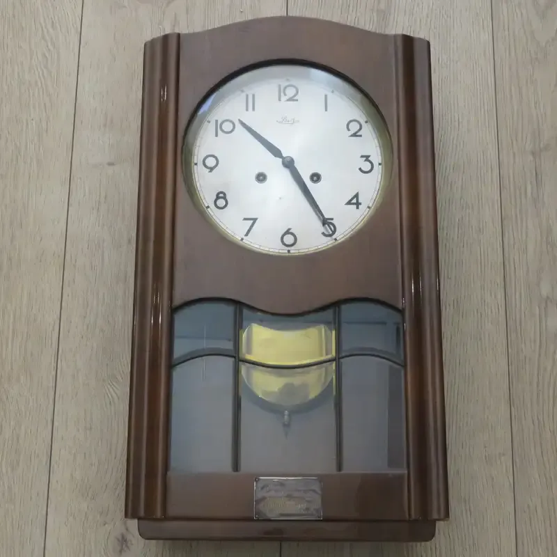 Vintage Sawy wall clock presented to Gert J. Geyser from director and staff of Blue Bell Wrangler
